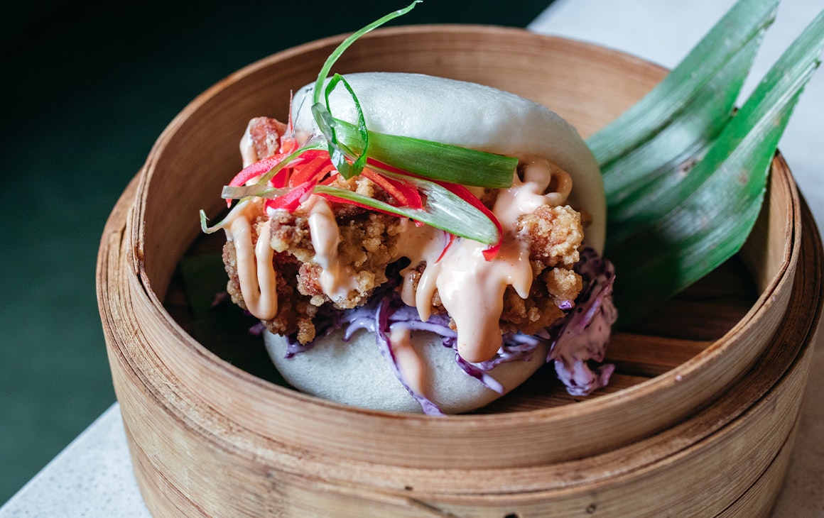 a bao bun in a basket